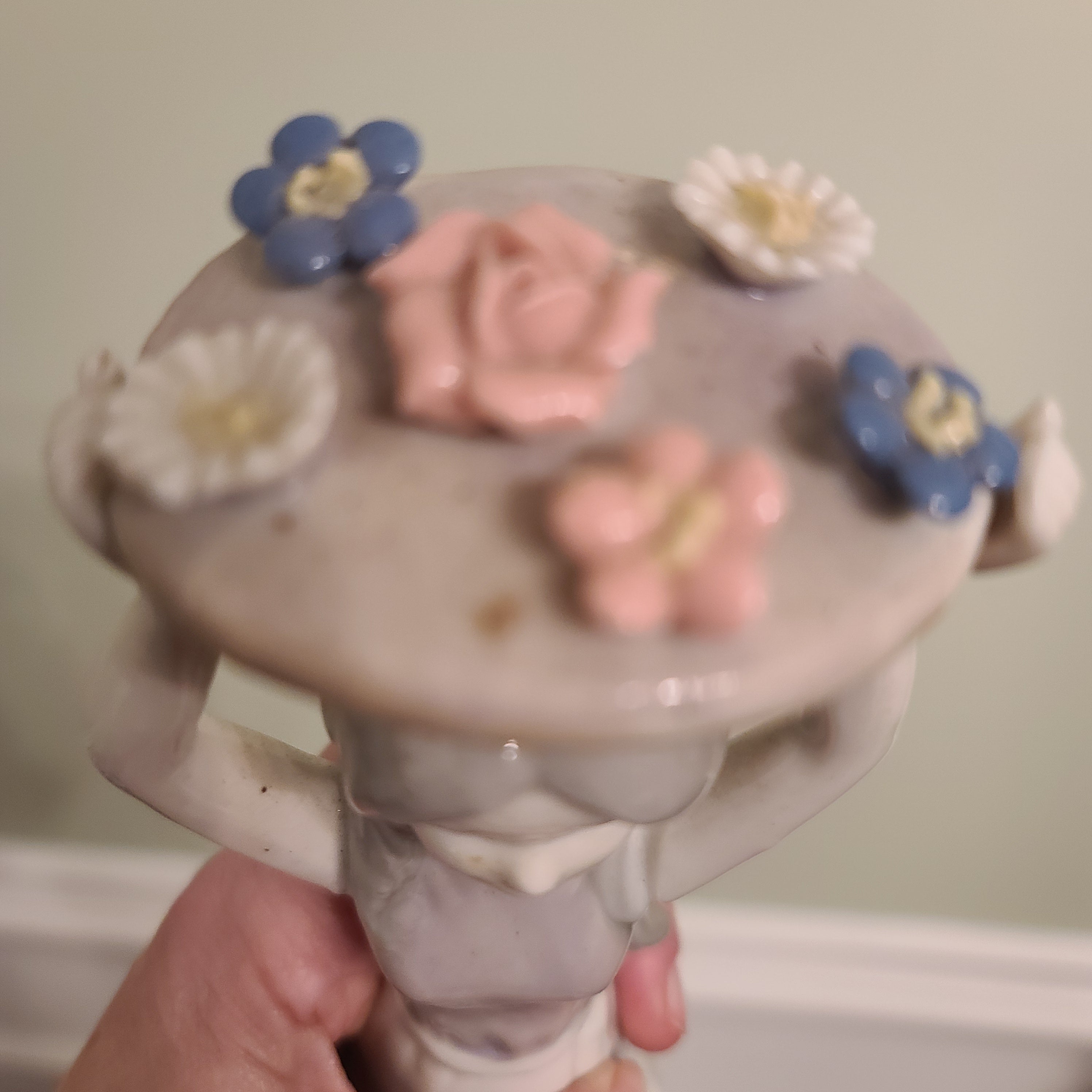 "Girl with a Basket of Flowers on Her Head", porcelain, painted, Europe, 2000-2015 (art. 34986)