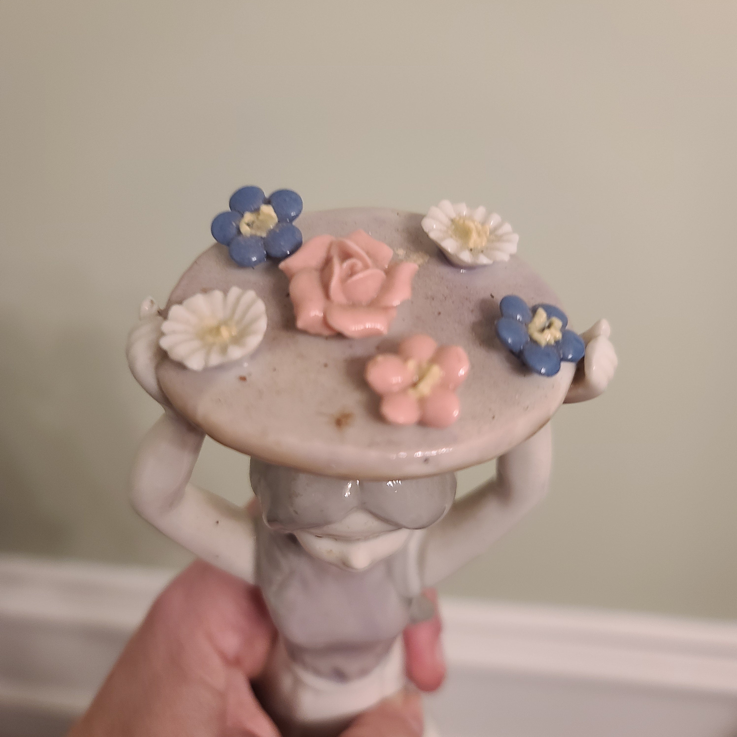 "Girl with a Basket of Flowers on Her Head", porcelain, painted, Europe, 2000-2015 (art. 34986)