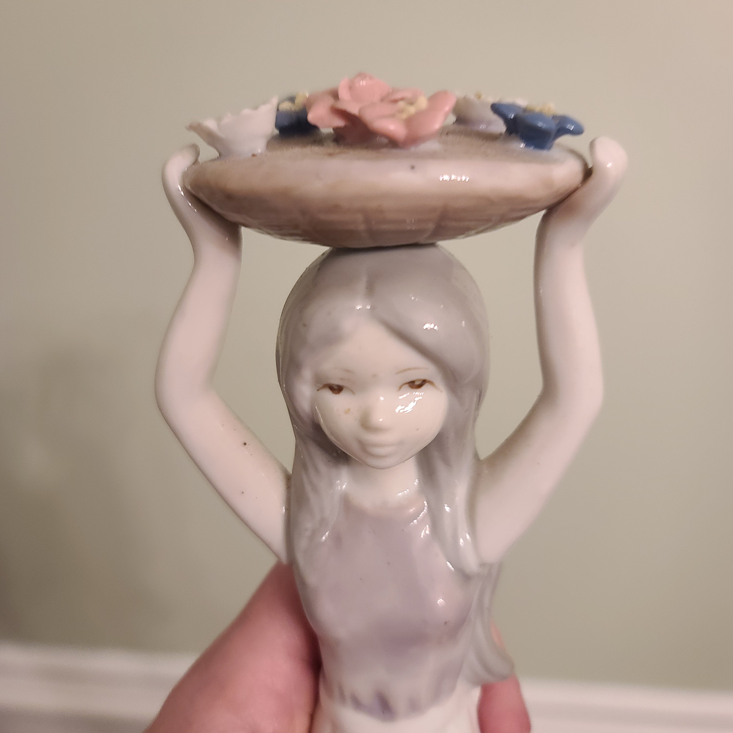 "Girl with a Basket of Flowers on Her Head", porcelain, painted, Europe, 2000-2015 (art. 34986)